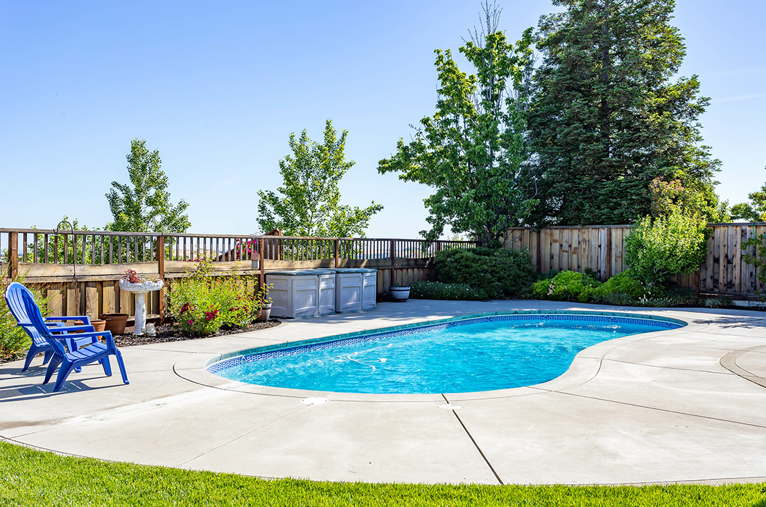 pool builders in waterford wi Backyard pool with tanning ledge — Waukesha WI